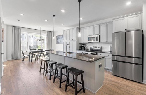 Rio House | This fully furnished, 3 bedroom/3.5 bath townhome immersed in the Belvedere neighborhood is less than 2 years old with all the updates and amenities on the interior for comfortable living.