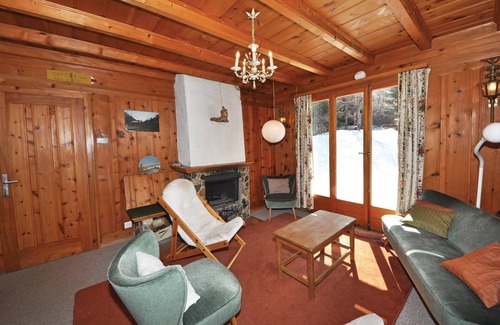 Zinal House | This original wooden chalet in retro style is located in the beautiful Val d'Anniviers, surrounded b