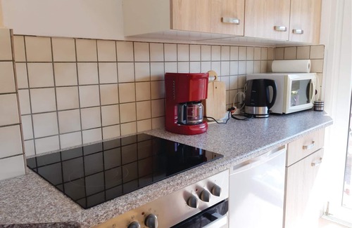 Bellin House | This practically furnished bungalow with terrace is part of a small vacation settlement.
