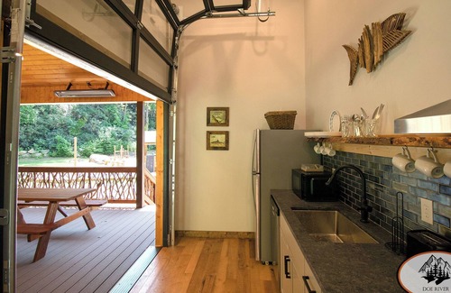 Roan Mountain RV Rental | This riverfront event pavilion touts scenic Roan Mt. views & LOADS of amenitie for your gathering!