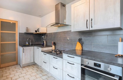 Roubaix House | This stylish and very spacious vacation home welcomes you to the town of Roubaix.