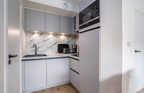 Camiers Apartment | This suite is equipped with a bedroom with a double bed & 2 sleeping corners of which one with a bunk bed and one with 2 single beds.