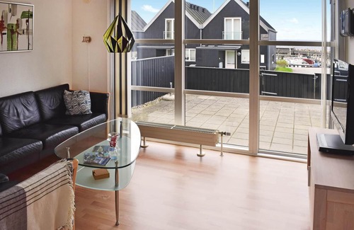 Lohals House | This terraced house is located only 50 m from the harbor in Lohals.