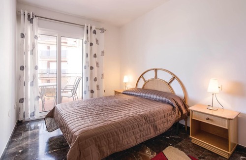 Los Puertos Apartment | This vacation apartment with modern equipment offers a magnificent view of the sea and the huge pool