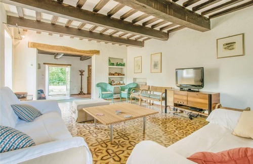 Apecchio House | This vacation home, a former farmhouse, is surrounded by lush woods and is located on a 20-hectare p