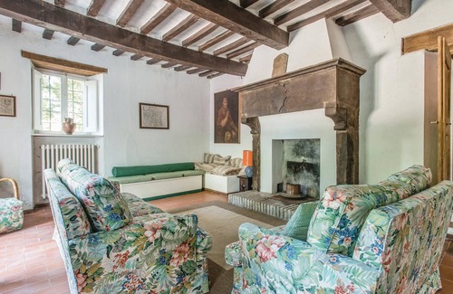 Apecchio House | This vacation home, a former farmhouse, is surrounded by lush woods and is located on a 20-hectare p