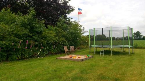 Tarp House | Thomsen - familienfreundliche Ferienwohnung mit großem Garten