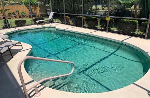 Palma Sola House | Three Bedroom Jungle Paradise with heated pool with everything you need for the beach