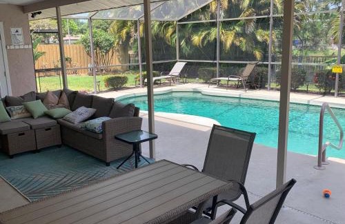 Palma Sola House | Three Bedroom Jungle Paradise with heated pool with everything you need for the beach