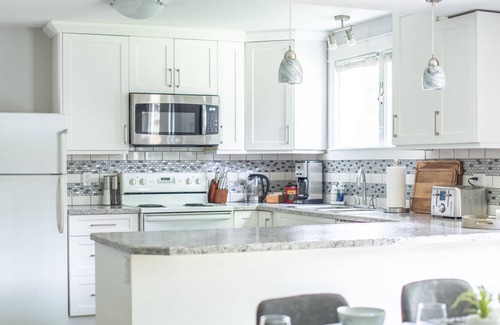 Rutland House | Three bedroom lower unit Townhouse in heart of Kelowna