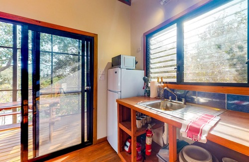 Surfside Cabin | Three forest cabanas with verandas, hammocks, WiFi & partial AC - walk to beach