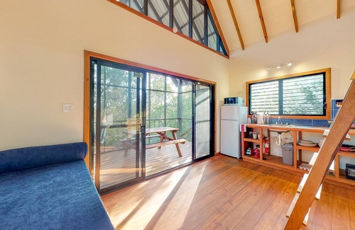 Surfside Cabin | Three forest cabanas with verandas, hammocks, WiFi & partial AC - walk to beach