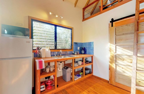 Surfside Cabin | Three forest cabanas with verandas, hammocks, WiFi & partial AC - walk to beach