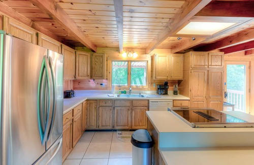 Livingston House | Three-story dog-friendly home with large deck, wood swing, firepit, lawn, & more