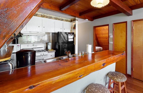 Bass Lake House | Three-story home in Willow Cove with 2 decks & great views - walk to Bass Lake