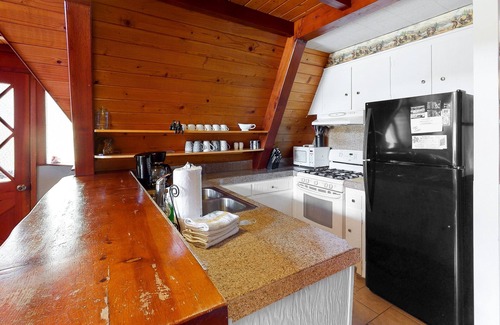 Bass Lake House | Three-story home in Willow Cove with 2 decks & great views - walk to Bass Lake