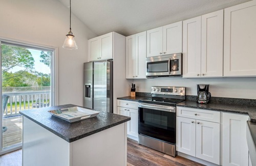 Butler Beach House | Tidal Paradise - Heated Pool & Firepit! Walk to the Beach!