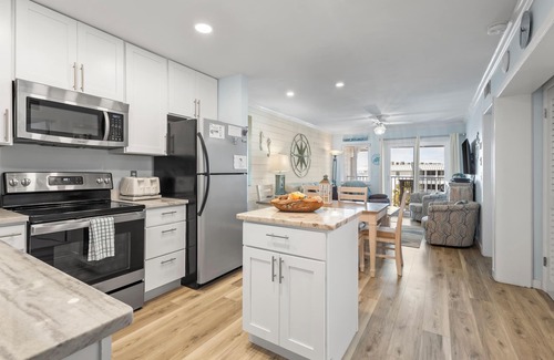 Alabama Gulf Coast Condo | Time to get… 🎶 Knee deep in the water somewhere! 🎶 on island time!