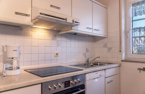 Harlesiel House | Time unwind: The townhouse is located behind the dike and has for d