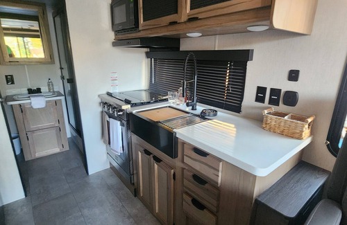 Colonial Beach House | Tiny House meets Camper w/a water view & beach access in Monroe Bay Campground!