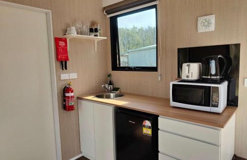 Buchan House | Tiny Retreat by the River by Tiny Away