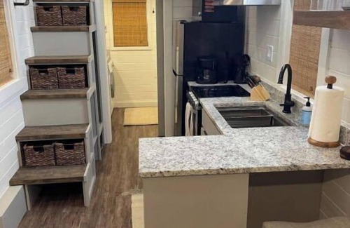 Unaka House | Tinyhome above waterfall, lake access