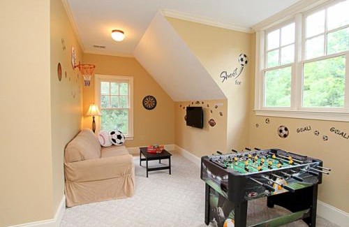 Big Canoe House | Tippy Canoe Lodge - Relax by the fireplace or play ping pong and foosball
