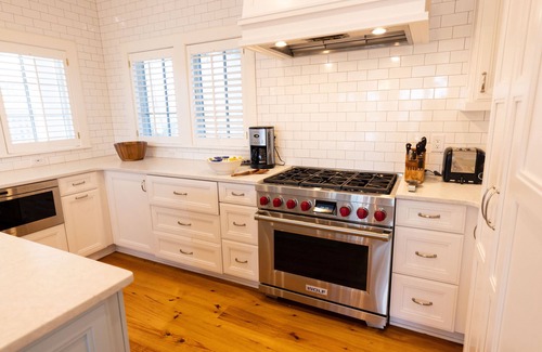 East Beach House | Tipsy Turtle delights with three floors of oceanfront luxury!