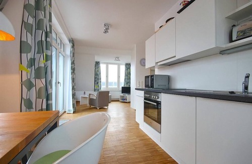 Wangerooge Apartment | Tolle Dachgeschosswohnung mit Meerblick und Ost-loggia - nur 100 m zum Strand!