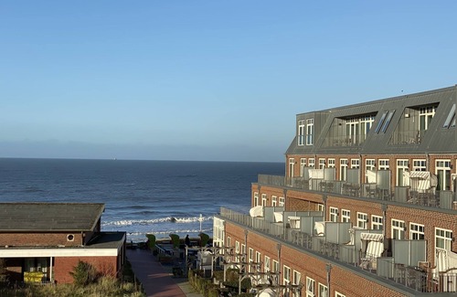 Wangerooge Apartment | Tolle Dachgeschosswohnung mit Meerblick und Ost-loggia - nur 100 m zum Strand!
