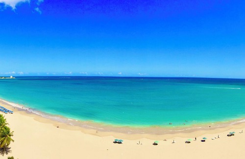 Isla Verde Apartment | Too Good To Be True Beachfront Condo, New Modern Renovation. Free WIFI/Parking.