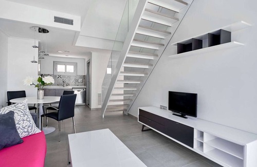 Torrevieja Apartment | Top floor apartment with sunny roof terrace, heated pool and garden