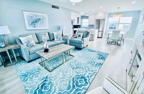 Fort Myers Beach Condo | Top Floor Beachfront & Sunset Views! Renovated! WIFI, Smart TV's + Work Space!
