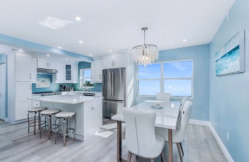 Fort Myers Beach Condo | Top Floor Beachfront & Sunset Views! Renovated! WIFI, Smart TV's + Work Space!