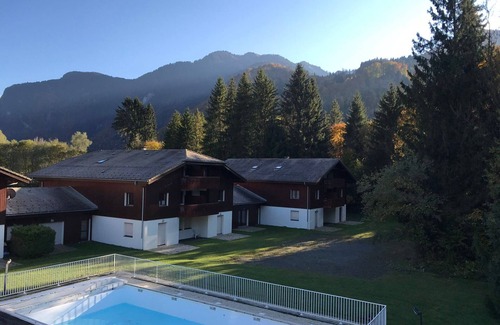 Samoens Apartment | Top floor studio with pools, sauna, gym, parking, and mountain views in Samoëns