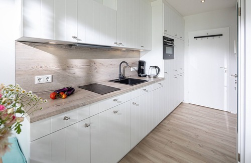 Norderney Apartment | Top sea view, one-room apartment, modern, directly on the beach with sauna and WLAN