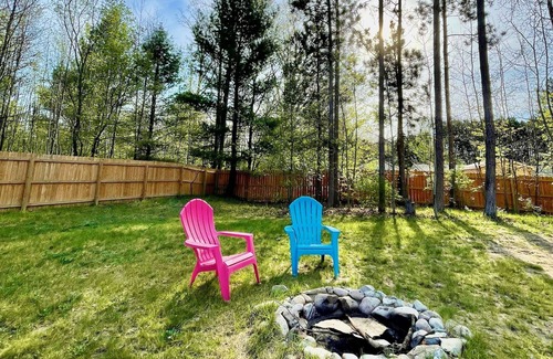 Rapid City House | Torch Lake Home: AC, arcades, game room, 3 min to Torch Lake! Bring your boat!