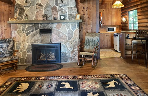 Alden House | Torch Lake Log Cabin, optional Malibu boat rental. Book now August specials!