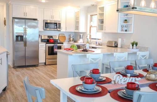 Rapid City House | Torch Lake Sandbar Waterfront Home - with Dock!