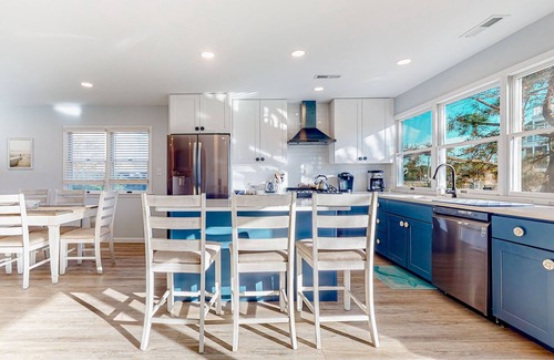 South Bethany Harbor House | Town of South Bethany renovated canal-front home with private dock & firepit