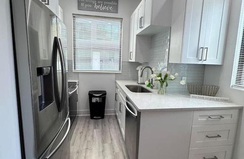 Egypt Lake-Leto Apartment | Townhome in central Tampa. Efficient floor plan with kitchen and half bath on the first floor. Upstairs has generous loft/office area, two bedrooms with ensuite bathrooms. On site laundry room.