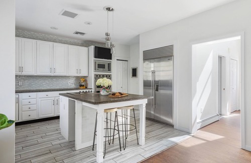 Northwest Harbor House | Traditional Immaculate Updated Home- Heated Pool, Gym, Yard- Close to EH and Sag