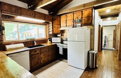 Harrison House | Trails Lodge retreat is steps fromnThe bar and ORV trails!
