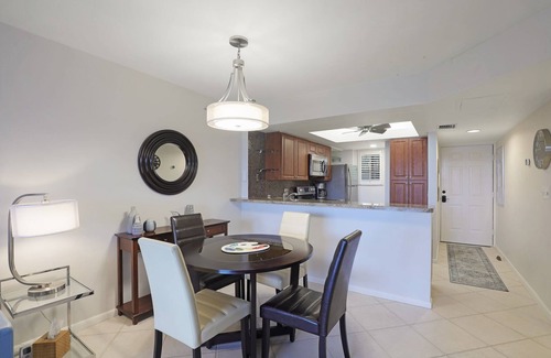 Bonita Bay Condo | 🌿Tranquil 2/2 Seasonal Getaway with Lake Views in Wild Pines in Bonita Bay! 🌊"