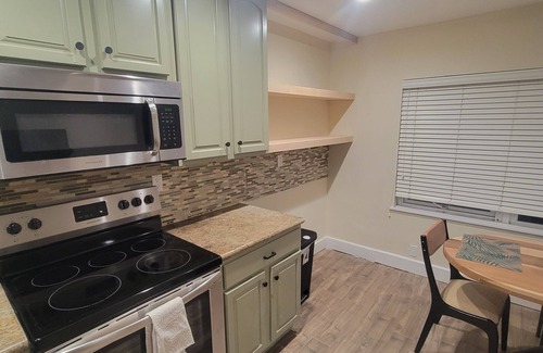Williams Town Condo | Tranquil and Cozy Space Nestled Steps From The Beach