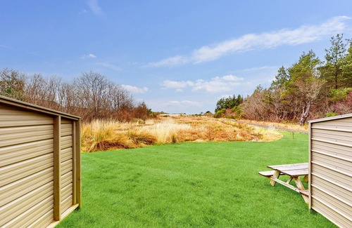 Grayland Condo | Tranquil dog-friendly condo with hot tub, kitchenette, fireplace, dune views