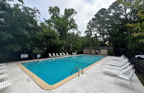 Night Heron House | Tranquil Forest Hideaway in Sea Pines – Private Home with Wraparound Porch