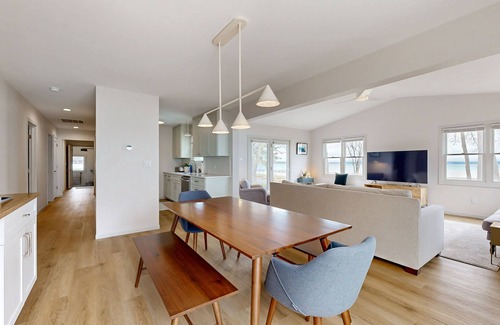 Suttons Bay House | Tranquil Lakeview Retreat in Suttons Bay, with a private sauna, & large yard