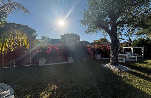 Coral Springs House | Tranquility meets Fun, a home away from home.10 minutes from Deerfield Beach.
