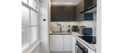 Faraday Apartment | Tranquility Touchdown: Your London Sanctuary